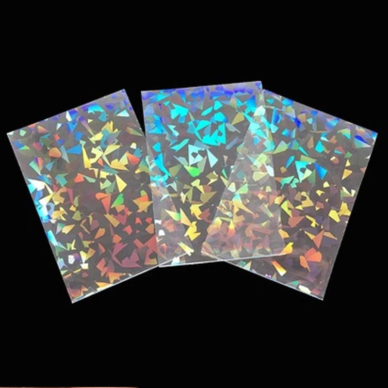 Three holographic card sleeves are displayed, showing iridescent, multicolored geometric patterns.