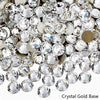A close-up view of sparkling crystal gold base rhinestones for nail art and crafts.