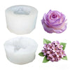 Three silicone molds showing a rose, a lilac flower, and a cluster of small purple flowers for crafting.
