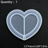 A clear silicone heart-shaped mold for resin casting with dimensions 5.3x4.6cm or 2.09x1.81in.