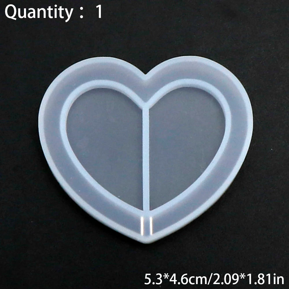 A clear silicone heart-shaped mold for resin casting with dimensions 5.3x4.6cm or 2.09x1.81in.
