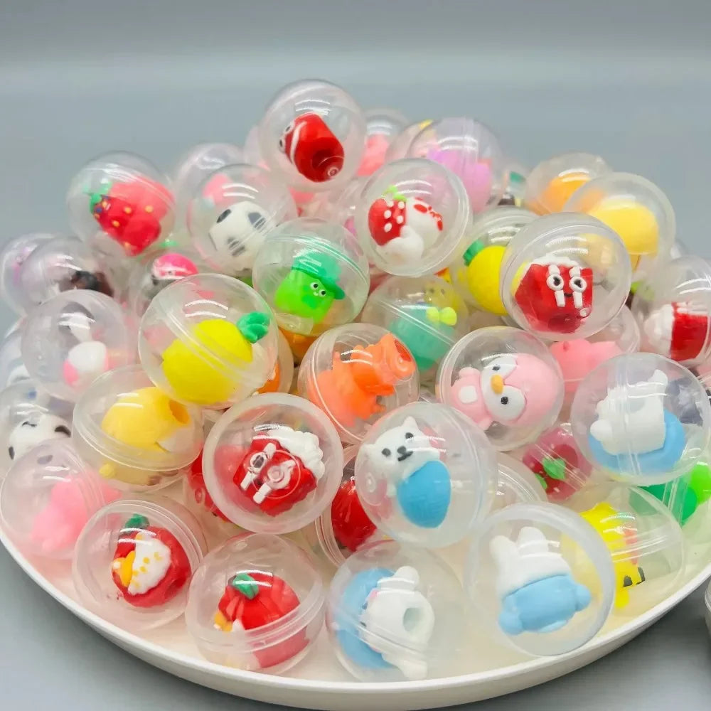A collection of transparent plastic eggshell party favors featuring various colorful candies and decorations.