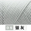 A close-up of a gray knitted yarn, labeled as Silver, showing the texture and twist of the fiber.
