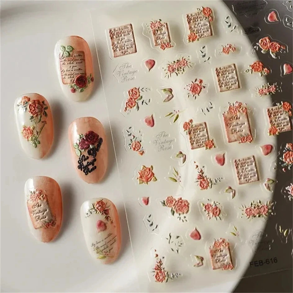 A sheet of nail art stickers featuring roses and gothic designs for fingernails.