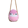 Hand-crocheted pink frog car mirror hanging ornament with a brown string