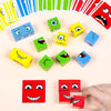 A collection of colorful wooden face-changing cube puzzle toys arranged in a semi-circle and scattered on a light background.