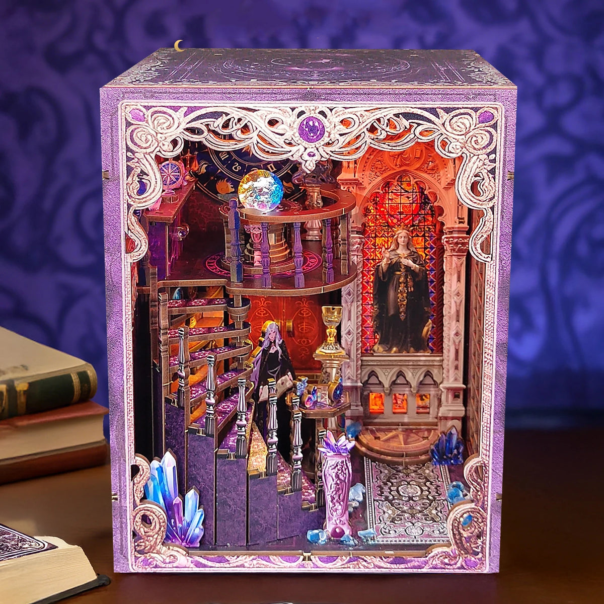 A decorative box featuring an ornate, gothic-style scene with purple and gold accents.