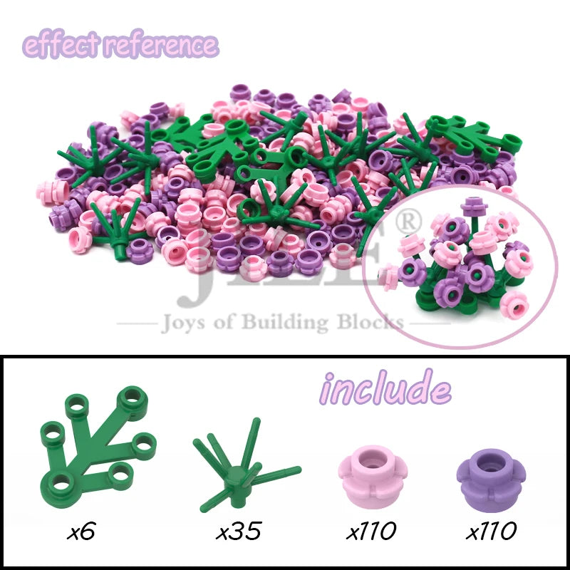 A collection of pink and green building blocks, including various shaped pieces like leaves and flowers.