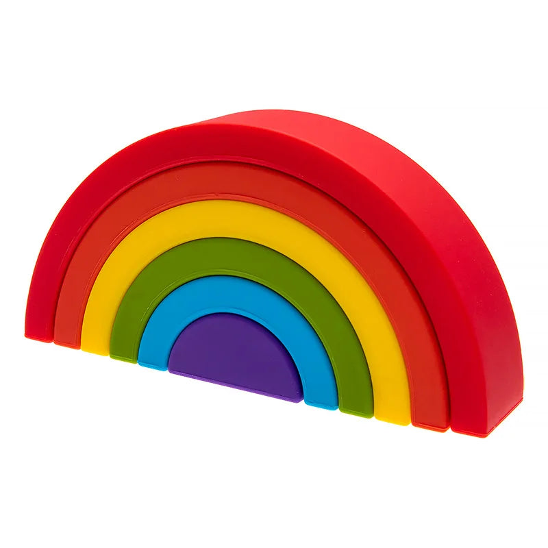A rainbow arch made of colorful silicone building blocks in a vibrant arc shape.