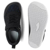 Side view of black and white minimalist barefoot sneakers with a wide toe box