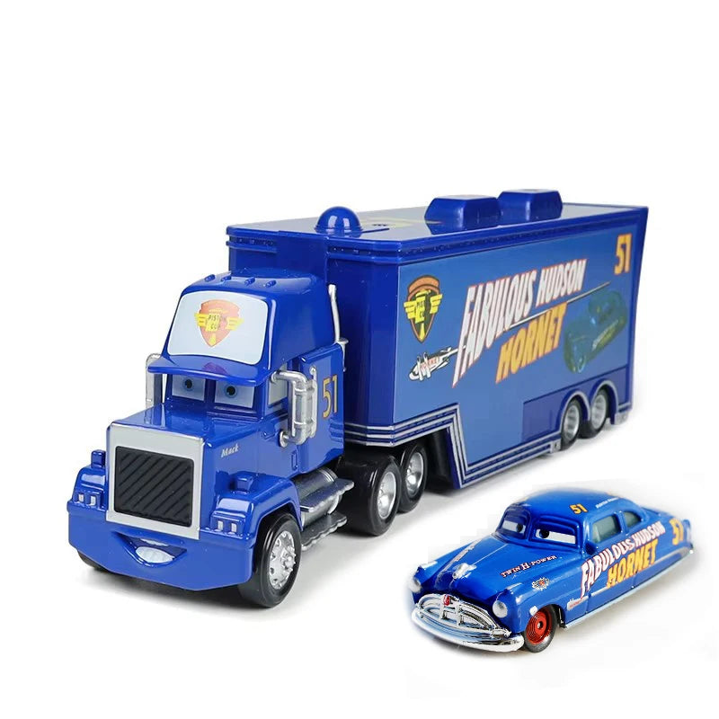 A blue die-cast toy hauler truck and a blue muscle car from Pixar Cars