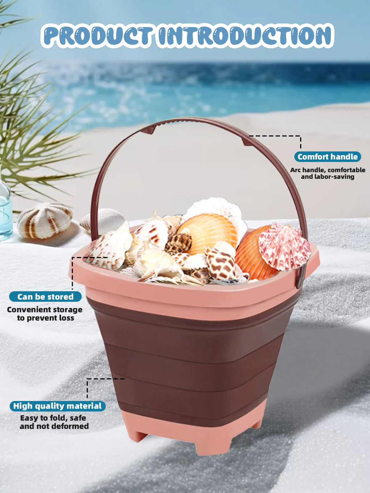 A pink expandable sand bucket toy with a comfort handle is shown outdoors on a beach setting.