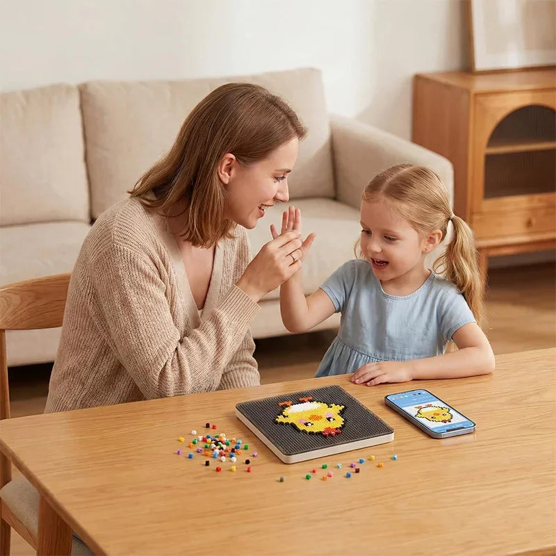 A woman and a girl are crafting with a Smart LED Pixel Art Bead Board on a wooden table.