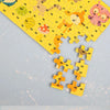 A partially completed 60-piece wooden jigsaw puzzle featuring various animals and vehicles on a light blue background.