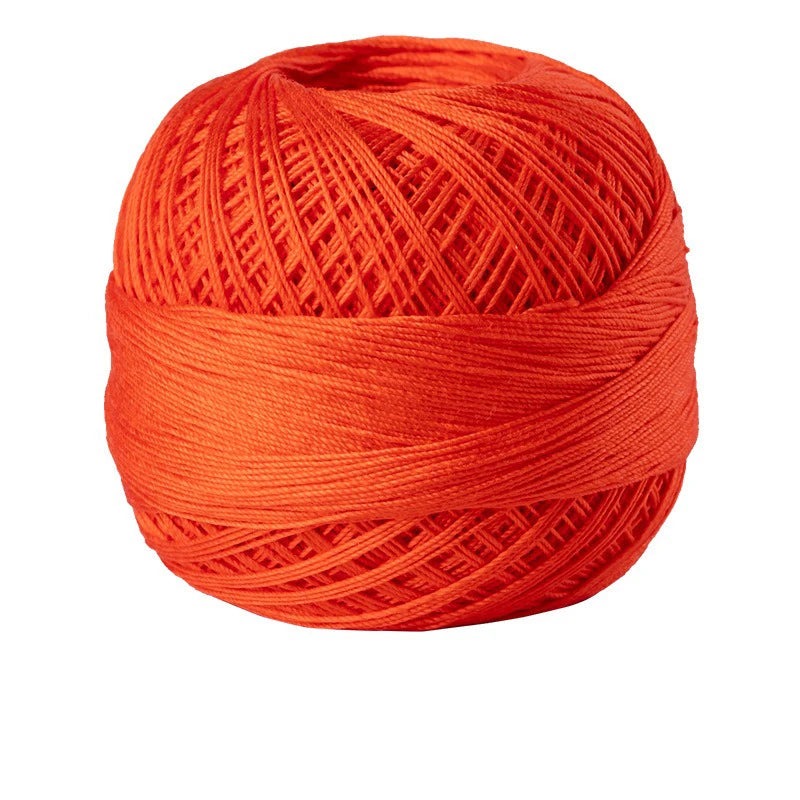 A ball of bright orange 100% cotton crochet thread for tatting and embroidery.