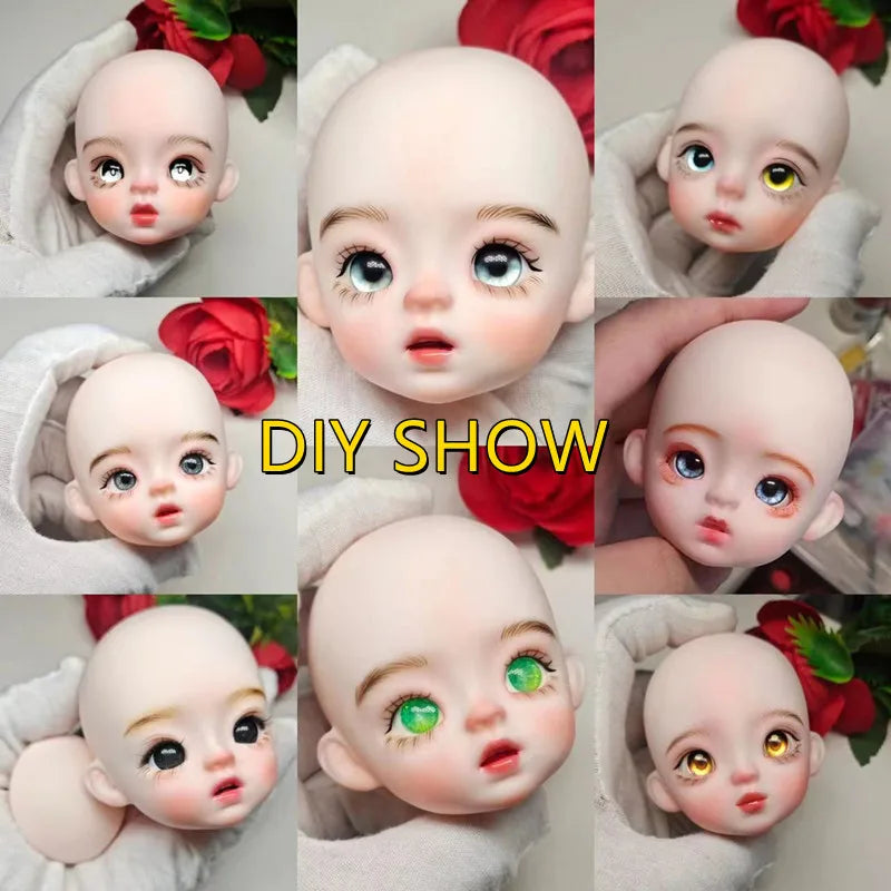 A close-up display of several realistic, baby-faced BJD dolls with large blue and green eyes, held in a white cloth.