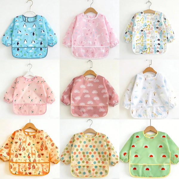 A collection of ten colorful waterproof full-sleeve baby bibs in various floral and patterned designs.