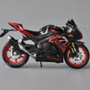 A black and red Suzuki GSX-R1000R diecast motorcycle model in a studio setting.
