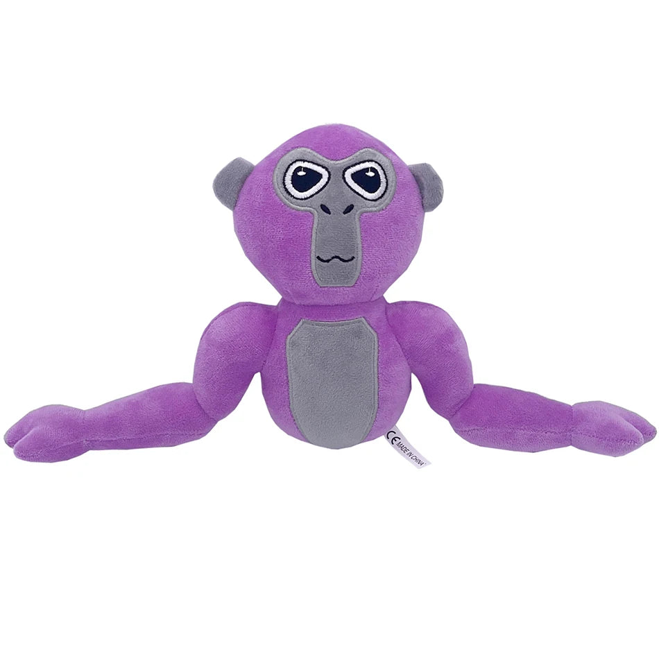 A purple and gray plush toy of a monke gorilla with large eyes.