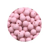 A pile of pink silicone beads in various sizes for DIY jewelry making