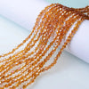 Strands of faceted amber and orange crystal beads for jewelry making