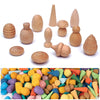 A collection of natural wooden rainbow building blocks in various colors and shapes.