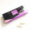 A package of Sculpey Souffle polymer clay in black and purple packaging.