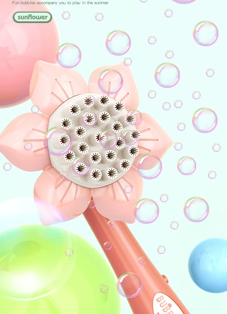 A pink sunflower-shaped bubble blower toy with a large central bubble mechanism and a green bubble in the foreground.