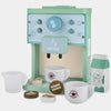 A light green wooden pretend play tea party set featuring a coffee machine design and several white cups.