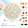 A set of silicone baby-themed cake molds including shapes for strollers, bottles, pacifiers, and other items.