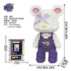 A detailed brick art bear figure in purple and gray, packaged with instructions.
