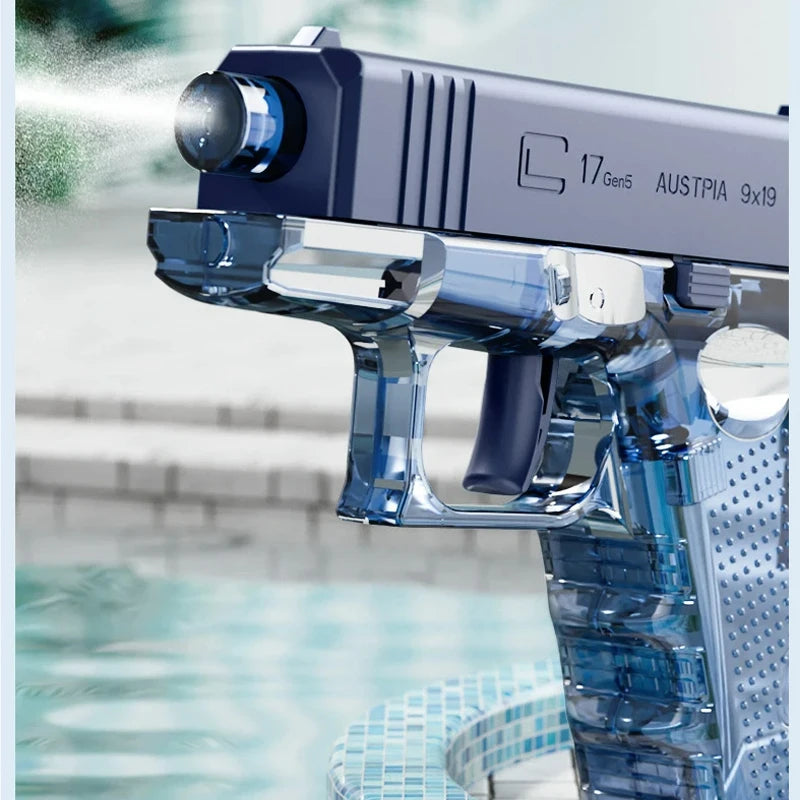 A blue high-power water blaster gun is shown aimed, with water spraying in an outdoor setting.