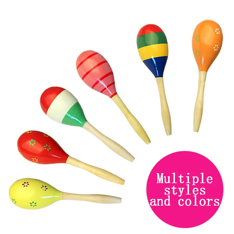 A collection of multiple wooden sand hammers or percussion instruments in various colors and designs.