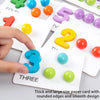 A hand is placing a blue wooden clip bead onto the number three card of a Montessori toy set.