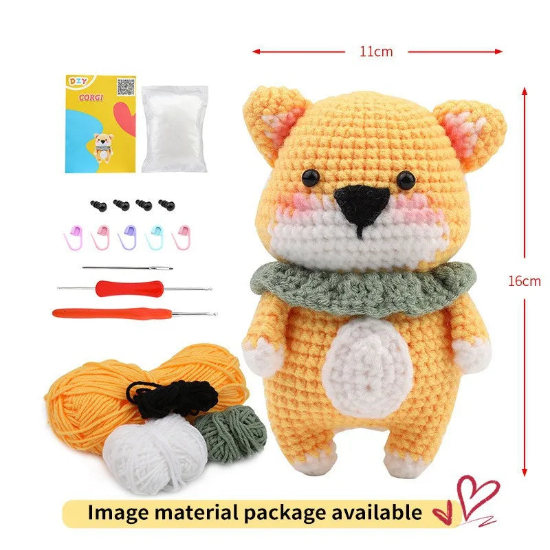 A yellow crocheted bear toy with pink ears and a complete set of crochet tools and yarn is displayed.
