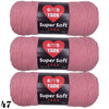 Three skeins of Super Soft pink acrylic yarn labeled GOVD YARN for crochet and knitting