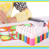 A set of water marbling paint art kits with various colored bottles and a plastic palette are shown on a white tray.