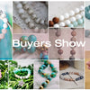 A collection of natural blue cat eye stone beads and finished jewelry pieces for buyers show.