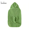 A soft, olive green baby windproof cape blanket with a dinosaur design.