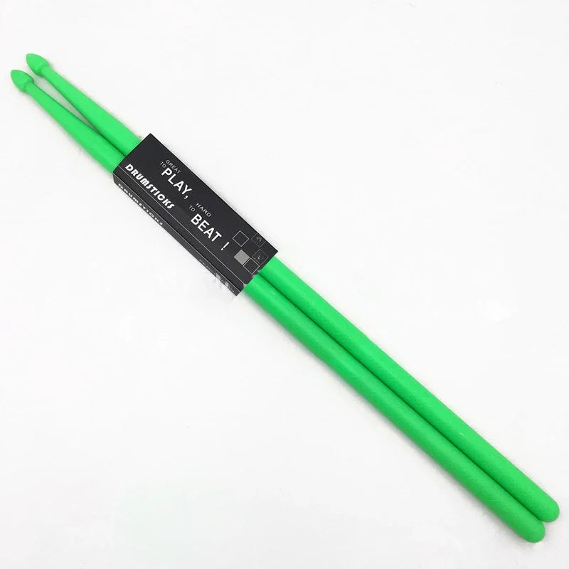 A set of colorful 5A nylon drumsticks with non-slip grips.