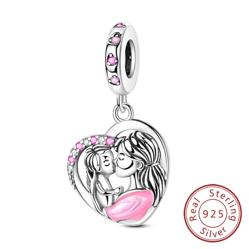 Sterling silver heart charm beads featuring a detailed engraving of two embracing women.