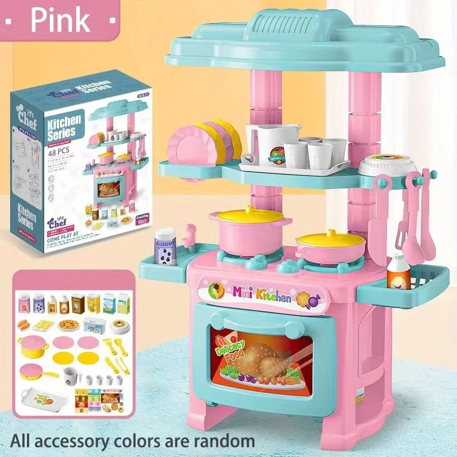 A pink mini pretend play kitchen set with cooking accessories and a storage box.