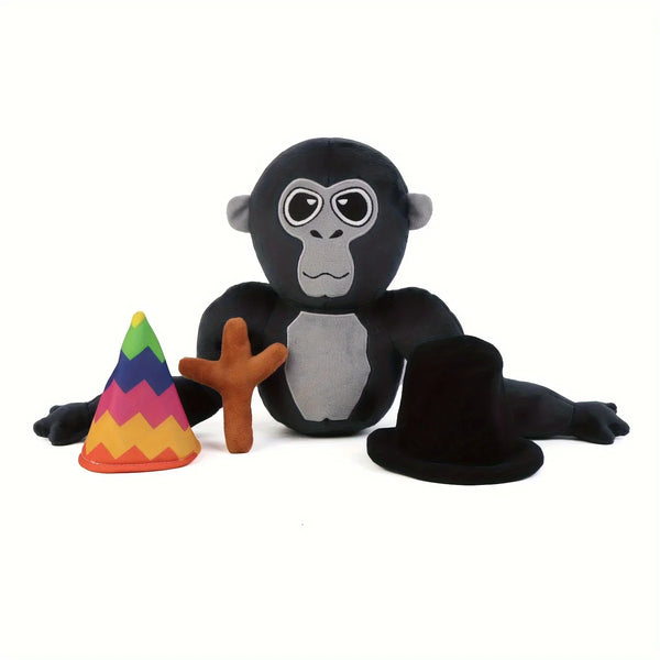 A black gorilla plush toy with gray facial markings and a yellow and green cone accessory.
