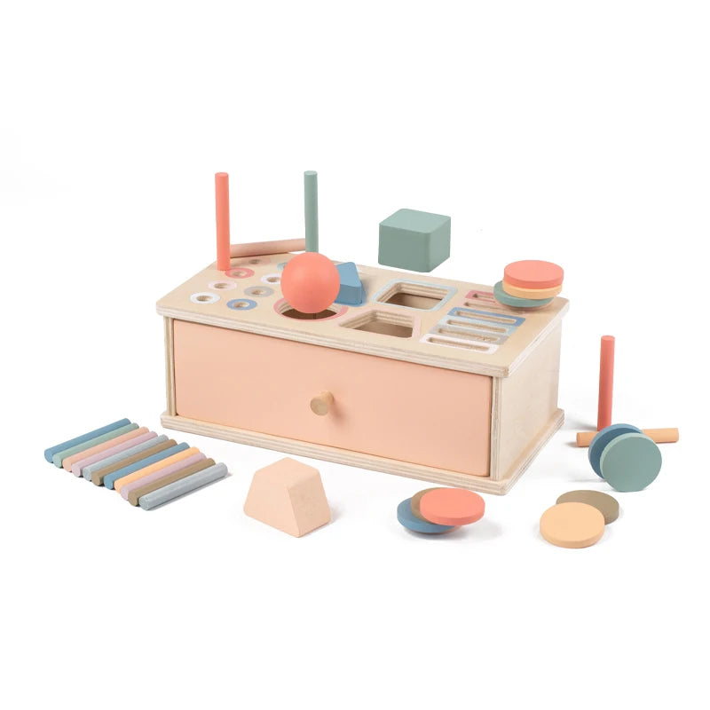 A wooden Montessori color and shape sorting box with various colored rods, spheres, and blocks.