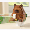 A detailed brown capybara building block model kit standing on a white base.