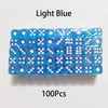 A strip of 100 light blue acrylic six-sided dice with transparent rounded edges.
