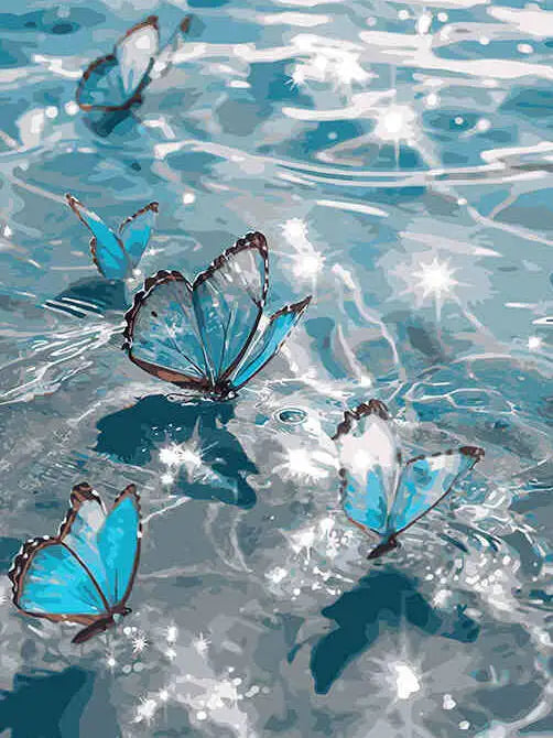 A close-up of blue butterfly paint by numbers on canvas floating in water.
