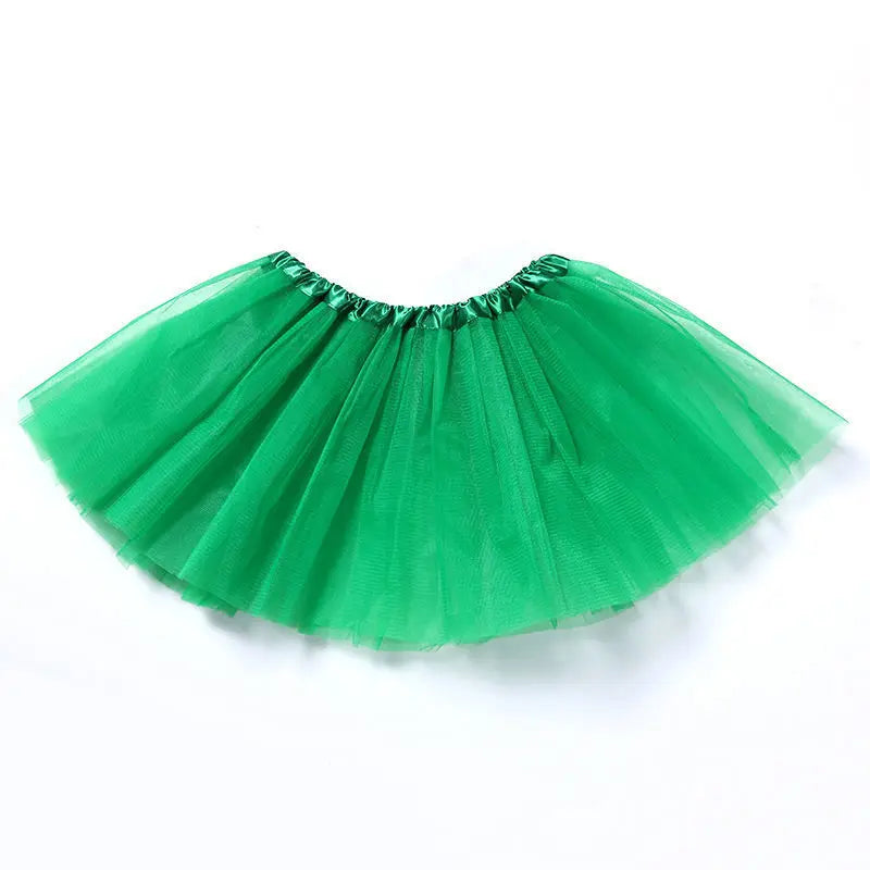 A vibrant green three-layer tutu skirt for girls displayed flat.