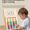 A toddler is playing a wooden color matching puzzle game with various colored buttons.