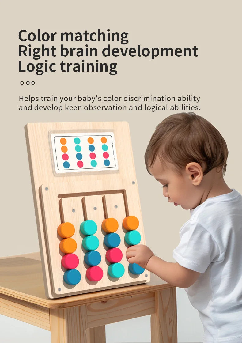 A toddler is playing a wooden color matching puzzle game with various colored buttons.